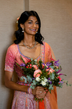 Photo of a woman holding flowers