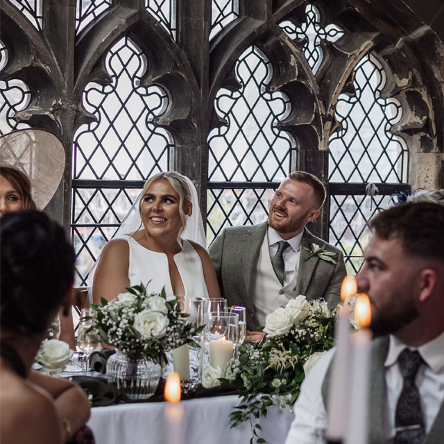 York Minster Refrectory wedding venue, couple at the top table