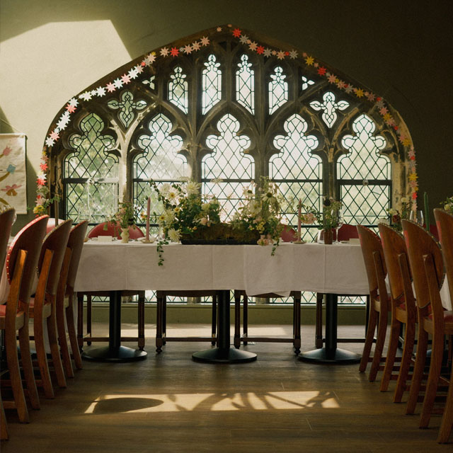 York Minster Refrectory wedding venue, view towards the top table, in front of the beautiful ornate window